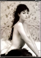 Monica Bellucci posing topless