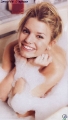 Jessica Simpson posing covered with foam in the bath
