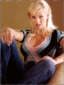 Elisha Cuthbert wearing blouse with plunging neckline