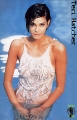 Teri Hatcher posing in wet hot dress inside the pool