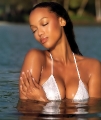 Tyra Banks posing in water showing hot neckline