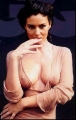 Monica Bellucci posing in hot transparent dress