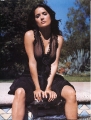 Salma Hayek posing in black hot dress